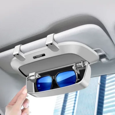 Smooth Damping Mechanism: Open and close the case effortlessly with its gentle damping design, ensuring a smooth and quiet operation. Protective Flocked Interior: The soft, flocked lining provides a gentle cushion for your glasses, preventing scratches and keeping them in pristine condition. Universal Fit: Compatible with any car model, this case ensures that your sunglasses are always within reach, no matter what vehicle you're driving. Preserves Sun Visor Functionality: Attach it to your sun visor without compromising its ability to shield you from glare, so you can drive safely and comfortably.